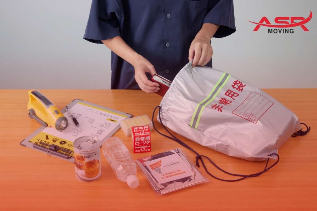 a man packing travel kit for cat